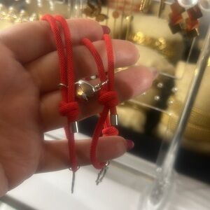 Vibrant Red Cord Bracelet with Silver Details